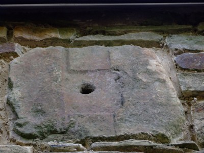 Stone sleeper sett built into wall of engine shed
