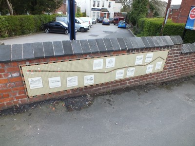 Bridge Parapet with route and description panels/tiles nr Crown Pub