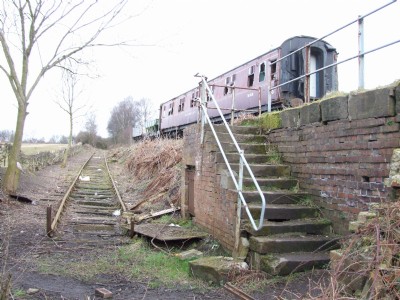 09.04.07 Butterley Co Rly, Grade up from Butterley works and footpath crossing now buried! Top yard siding with coach