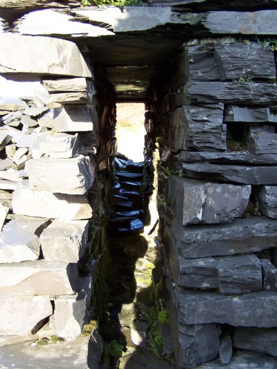 Gap in building wall for a belt drive