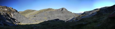 A panoramic view from Wrysgan showing the vast slate tips of Cwmorthin