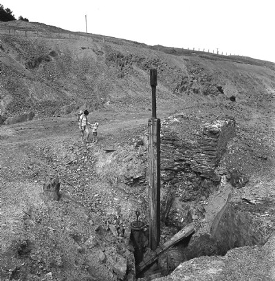 Llechwedd Ddu shaft with pump rod and rising main. 1976