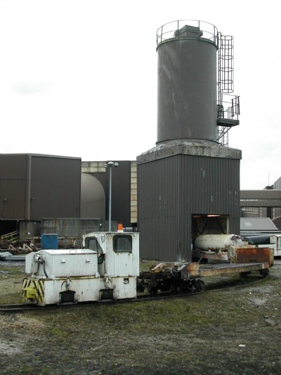 Clayton Loco on Train under Cement tower
