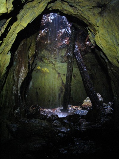 Water running down shaft into adit