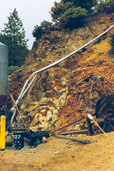 Flume of PH 1 water from portals no longer in use, Richmond and Lawson, at Iron Mountain Mine.
