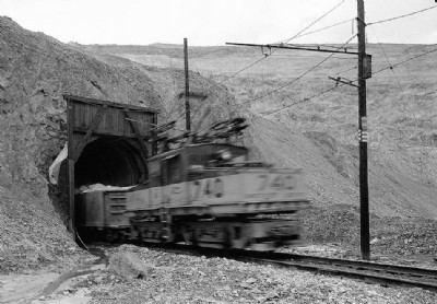Train emerging from tunnel