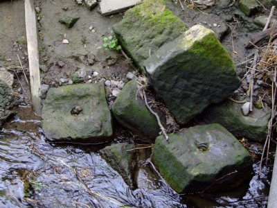 Single Hole Stone sleeper blocks under Denby branch bridge into Pottery May 08 - note spikes
