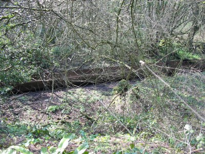Iron trough to prevent the surface stream entering mine through fissures.
