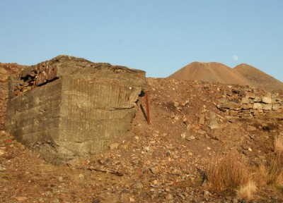 Plant foundations beside the tip from the lower level