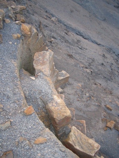 Cistern falling off clif edge