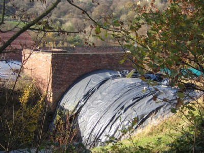 Area behind fanhouse, which covers shaft.
