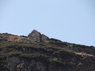 Ruined brake drum house above incline.