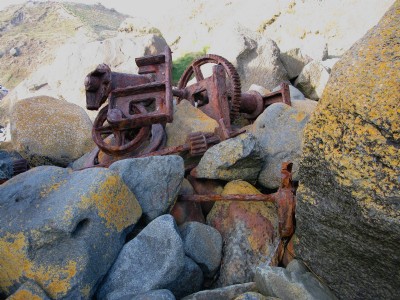 Winch and other ironmongery on the beach
