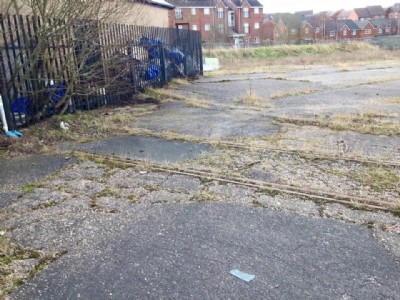 Standard and Narrow Gauge Railway Track Embedded in Concrete