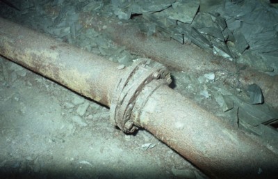Wedged joint in rising main.