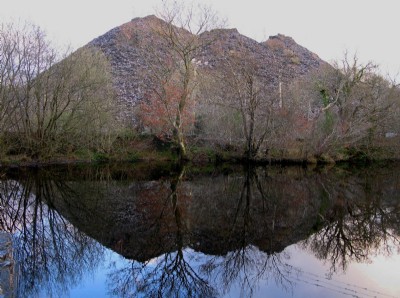 Tips reflected in reservoir on Afon Galedffrwd