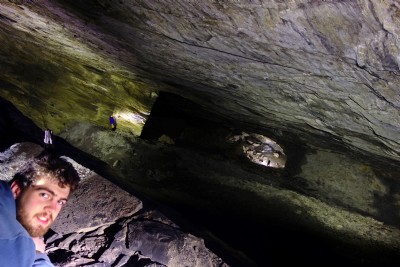 Grinning in a large cavern